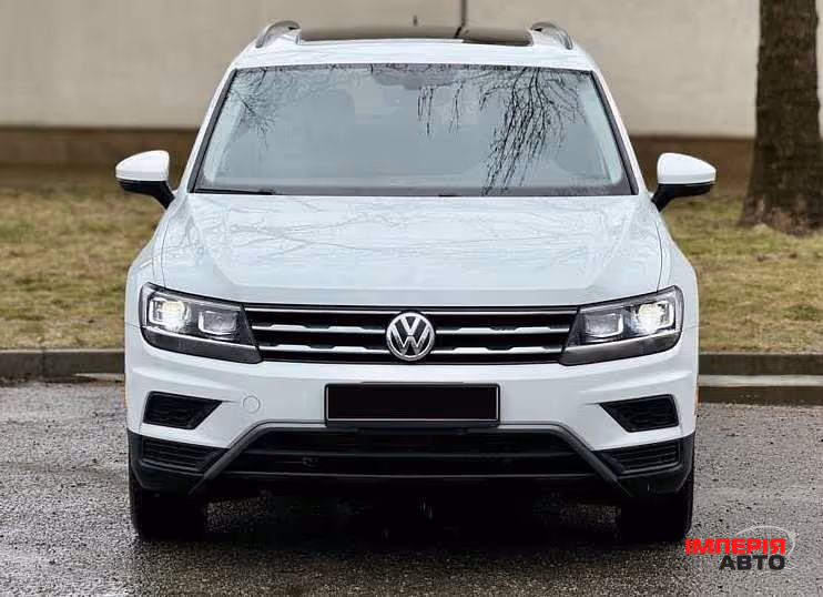 Volkswagen Tiguan - фото 1