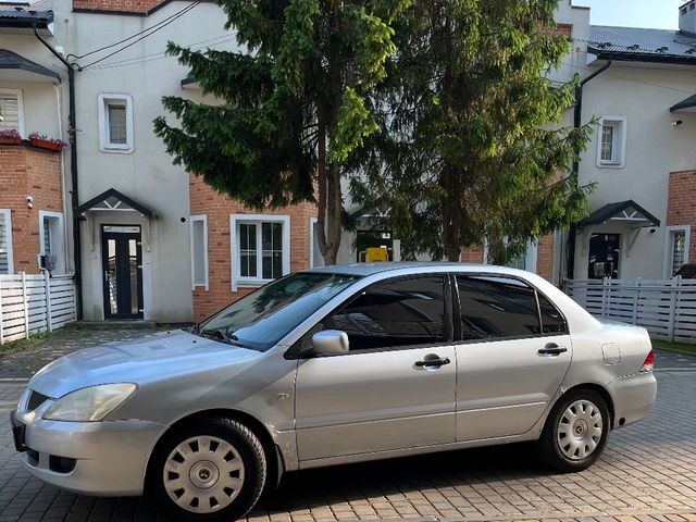 Mitsubishi Lancer - фото 3