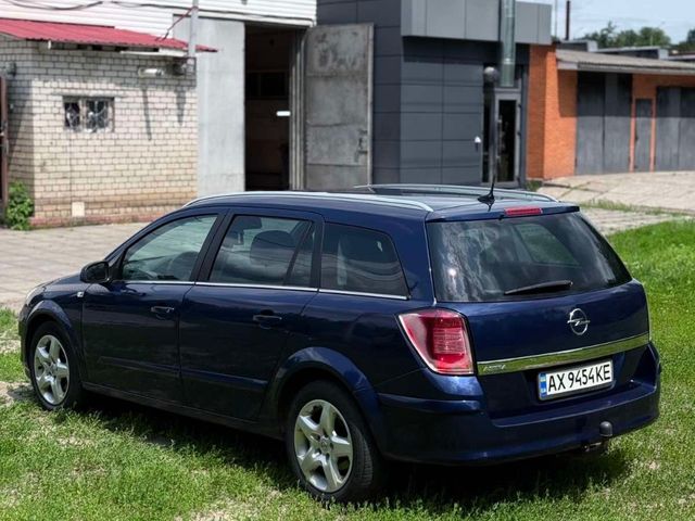 Opel Astra - фото 5