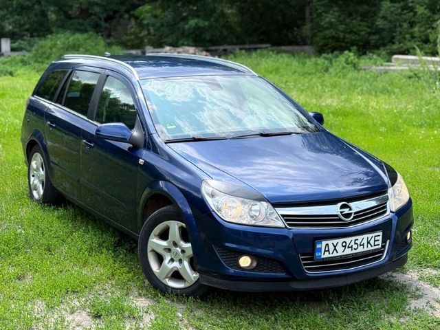 Opel Astra - фото 1