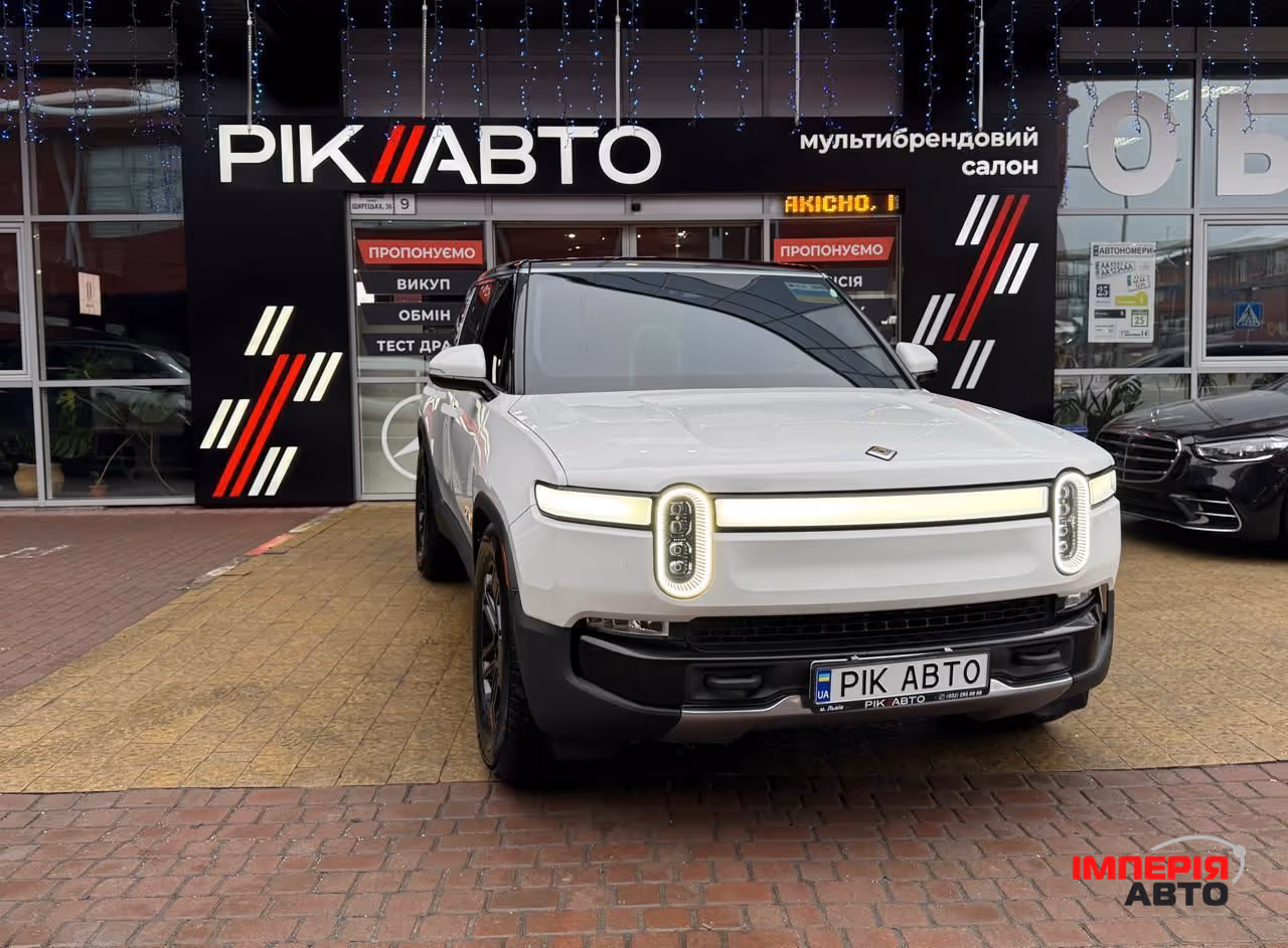 Rivian R1S - фото 1