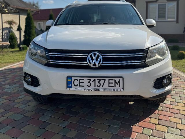 Volkswagen Tiguan - фото 1