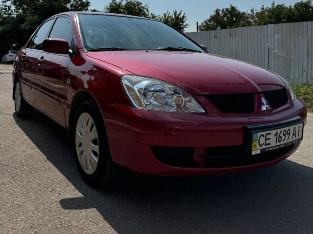 Mitsubishi Lancer - фото 3
