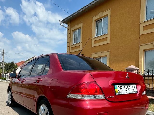 Mitsubishi Lancer - фото 5