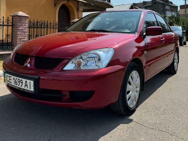 Mitsubishi Lancer - фото 2