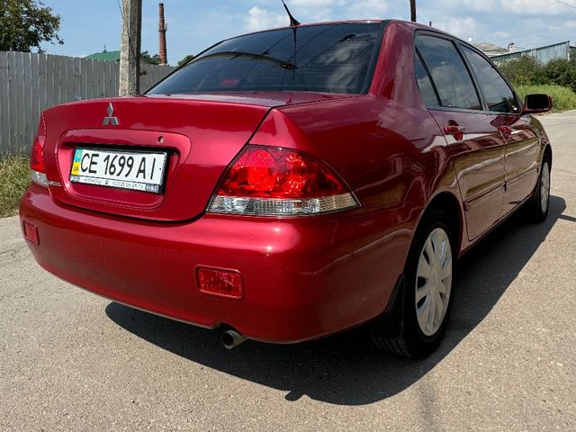 Mitsubishi Lancer - фото 4