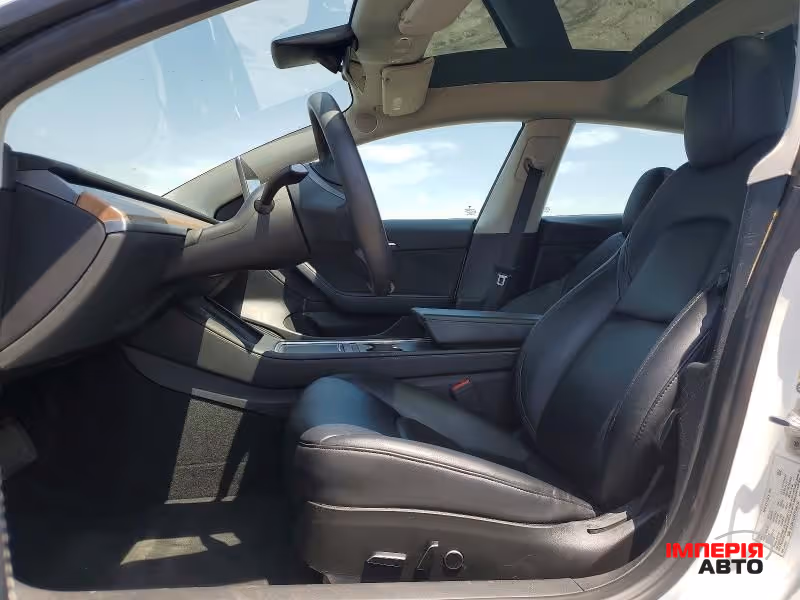 Tesla Model 3 - фото 7