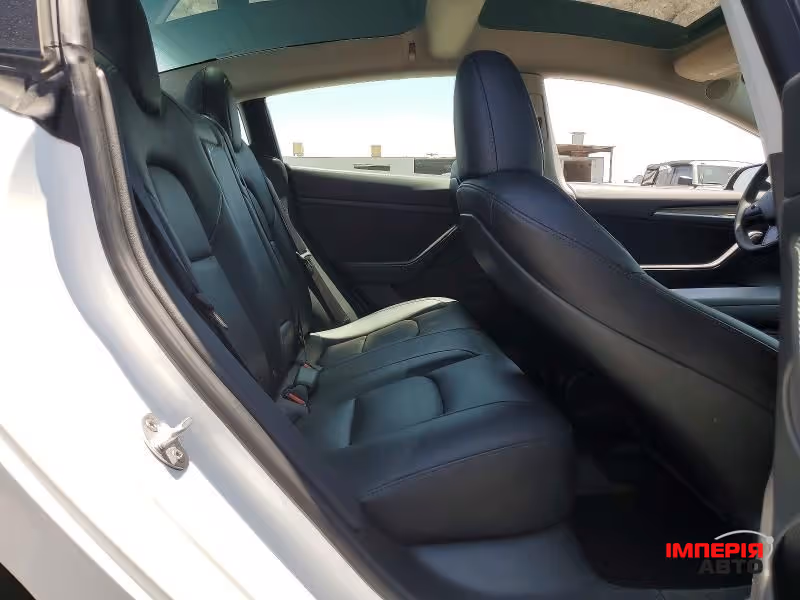 Tesla Model 3 - фото 10