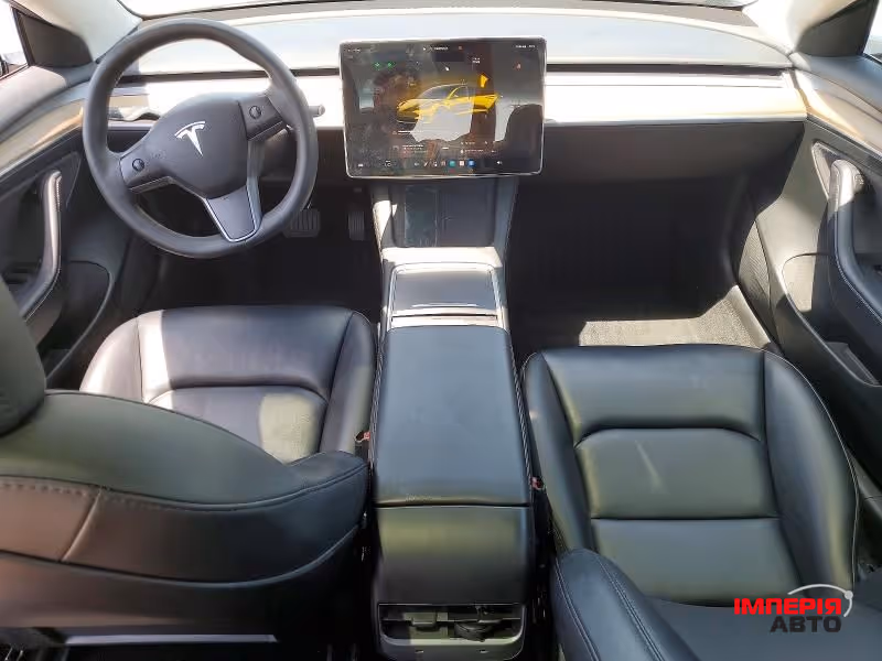 Tesla Model 3 - фото 8
