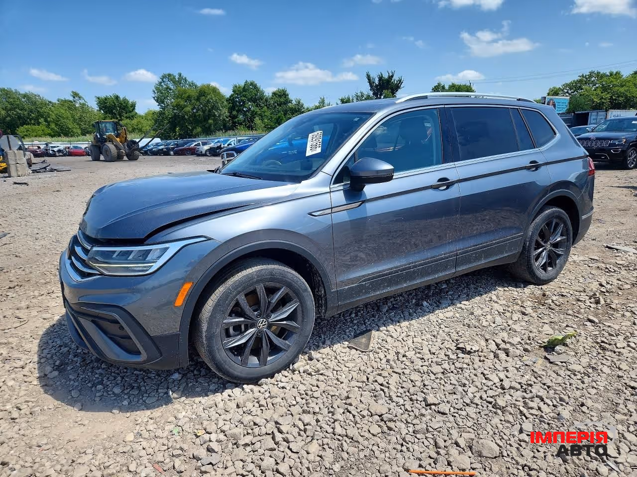 Volkswagen Tiguan - фото 1