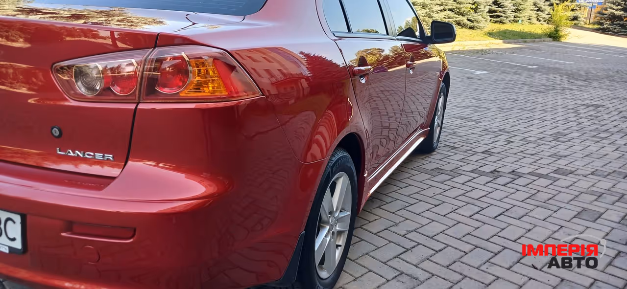 Mitsubishi Lancer - фото 16