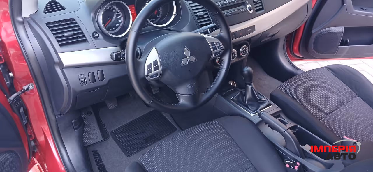 Mitsubishi Lancer - фото 35