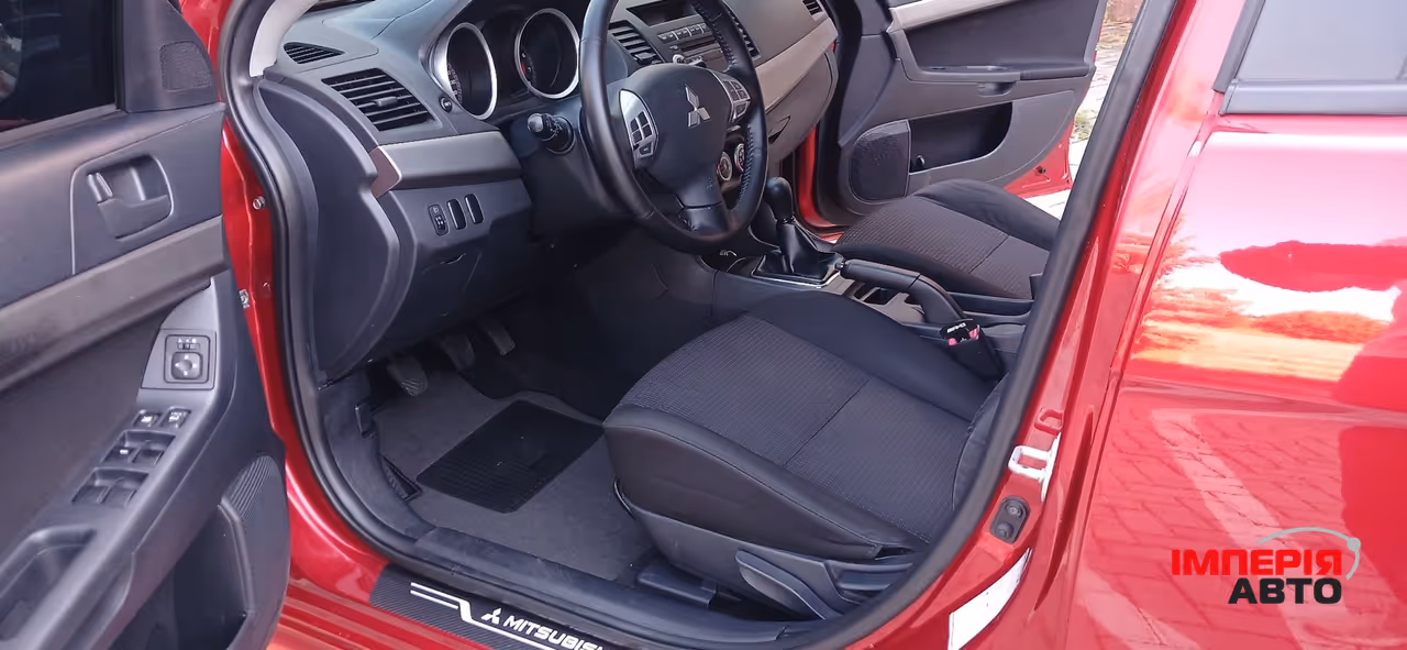 Mitsubishi Lancer - фото 31