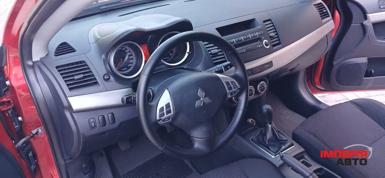 Mitsubishi Lancer - фото 32