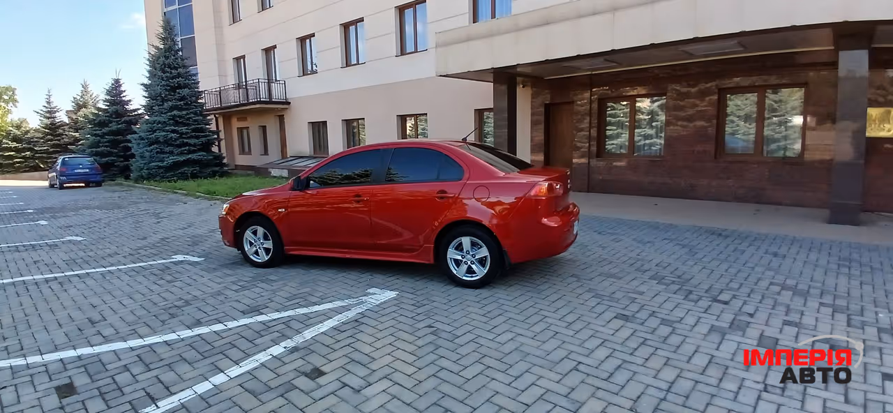 Mitsubishi Lancer - фото 39