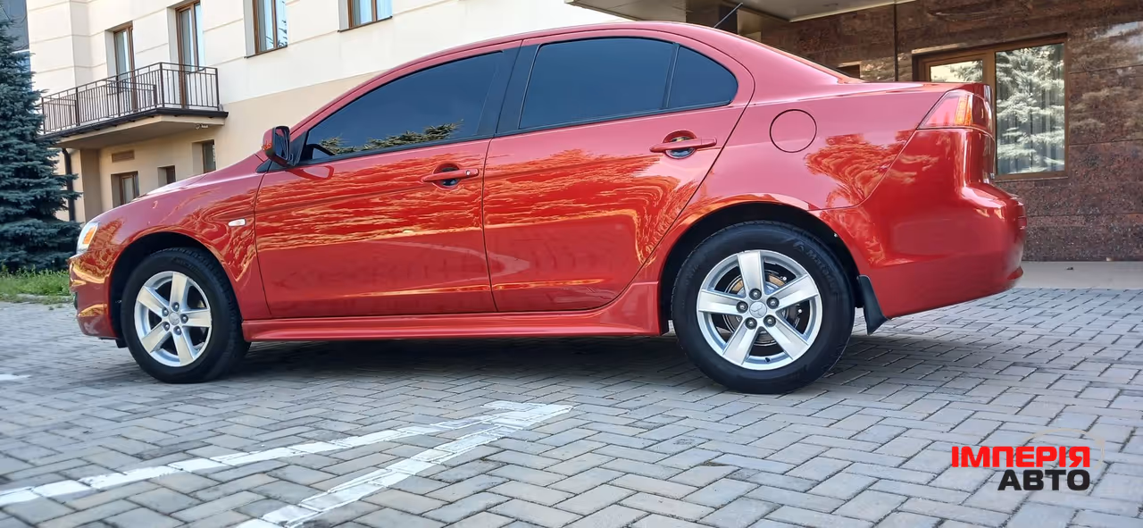 Mitsubishi Lancer - фото 9