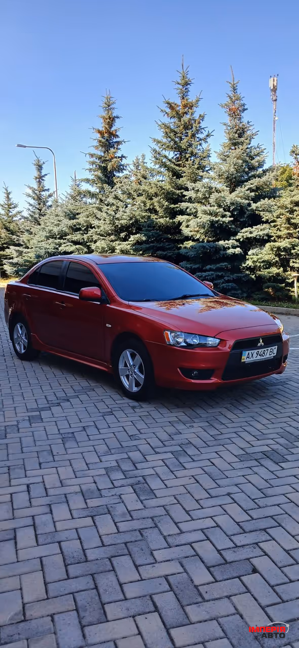 Mitsubishi Lancer - фото 1