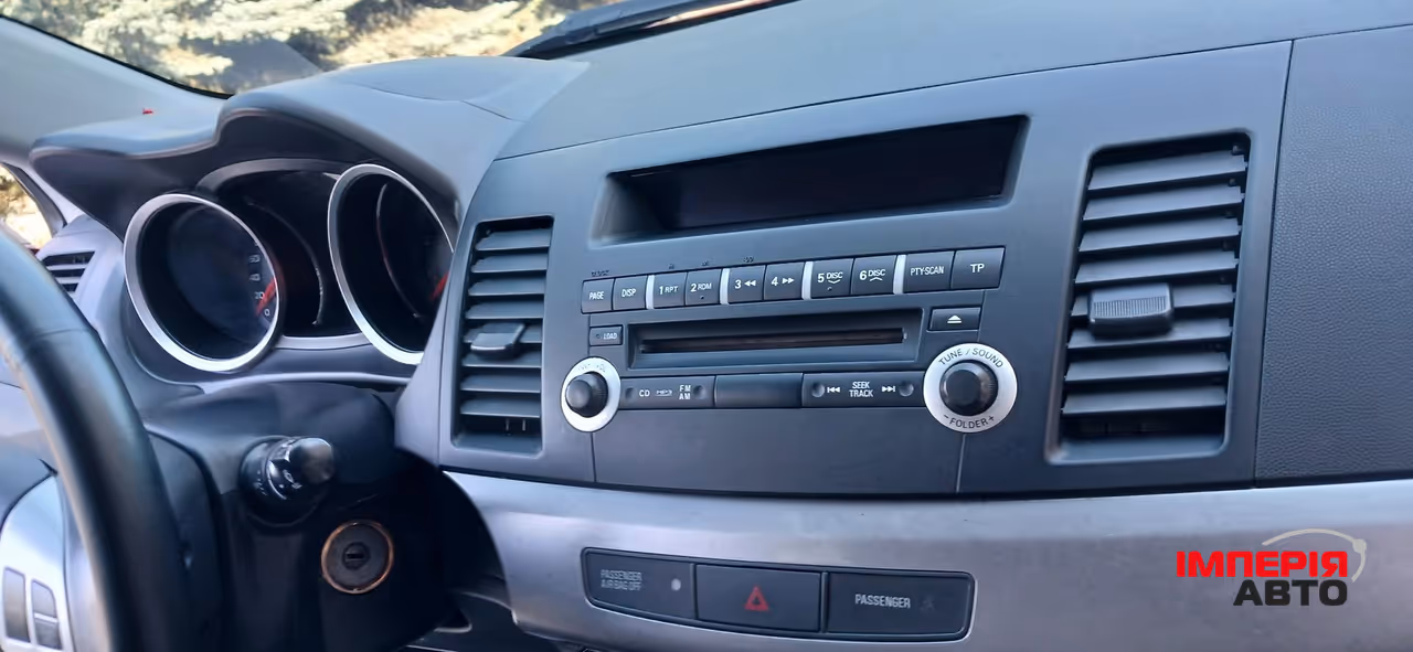 Mitsubishi Lancer - фото 30