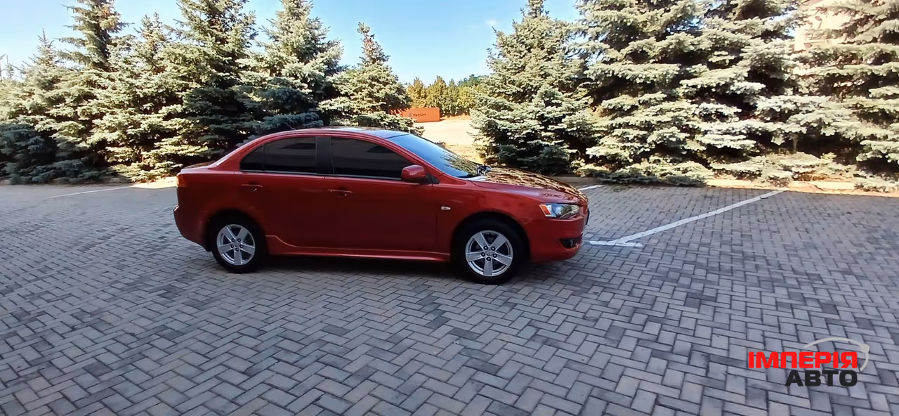 Mitsubishi Lancer - фото 40