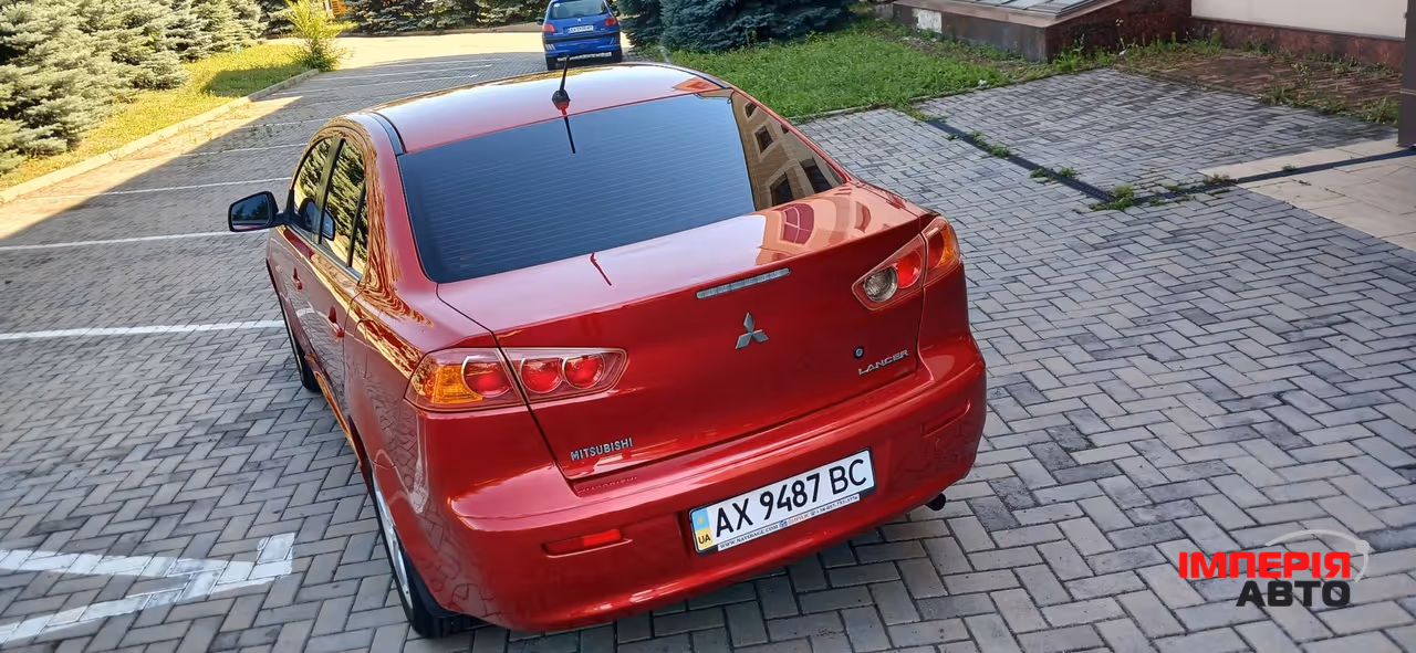 Mitsubishi Lancer - фото 14