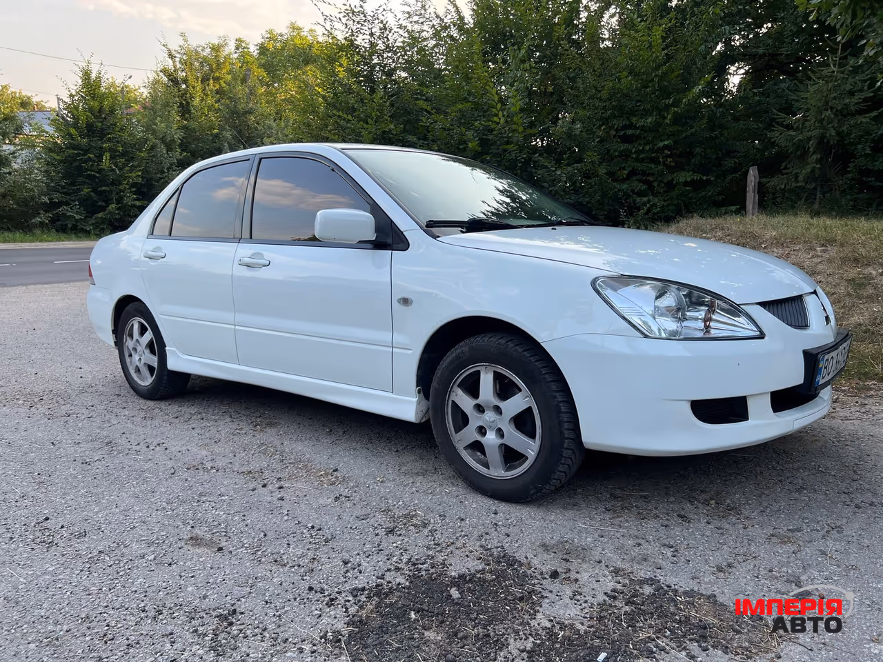Mitsubishi Lancer - фото 1