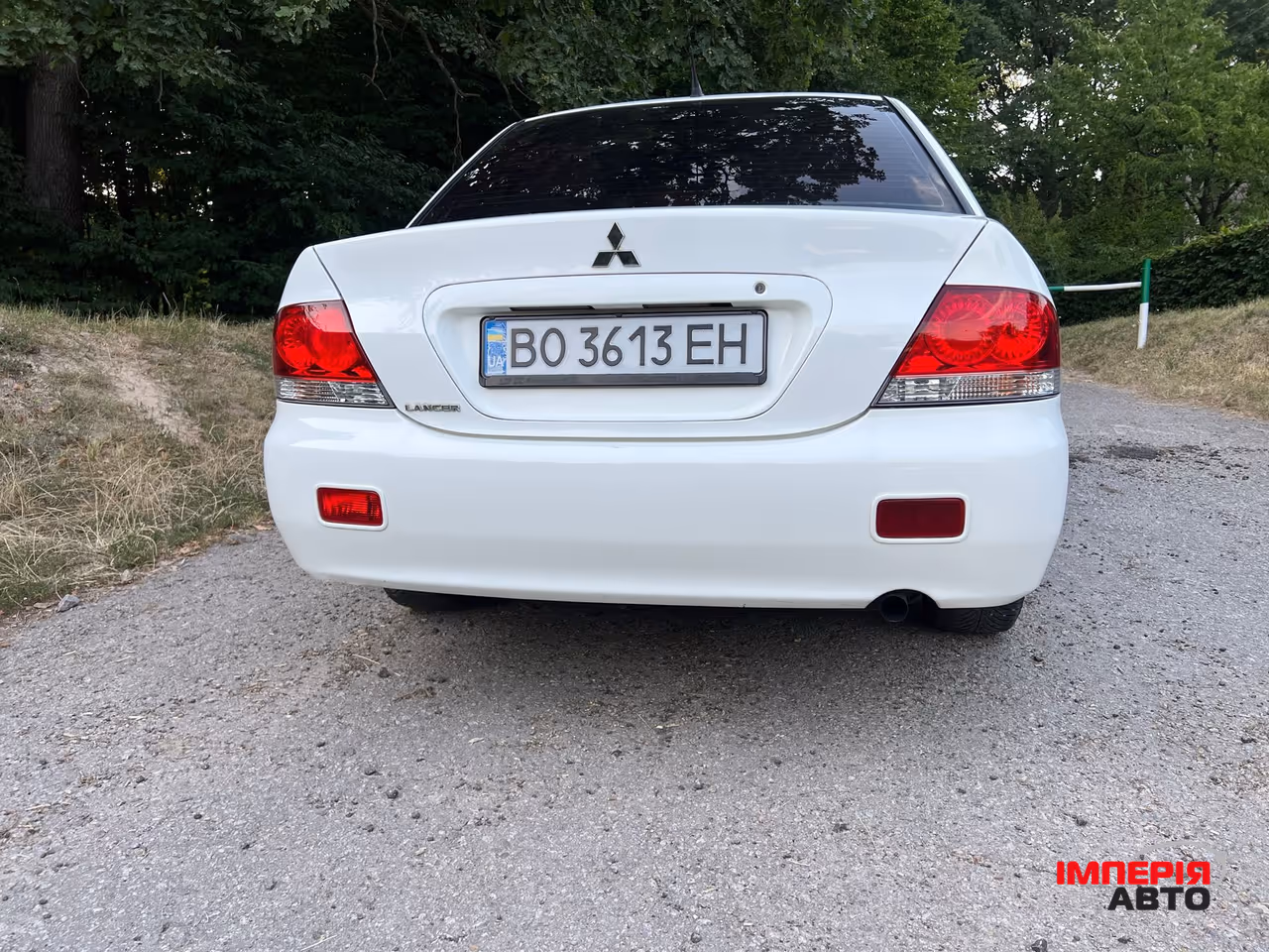 Mitsubishi Lancer - фото 4
