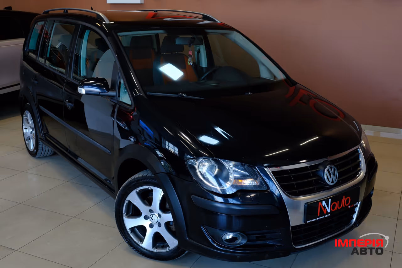Volkswagen Touran - фото 4