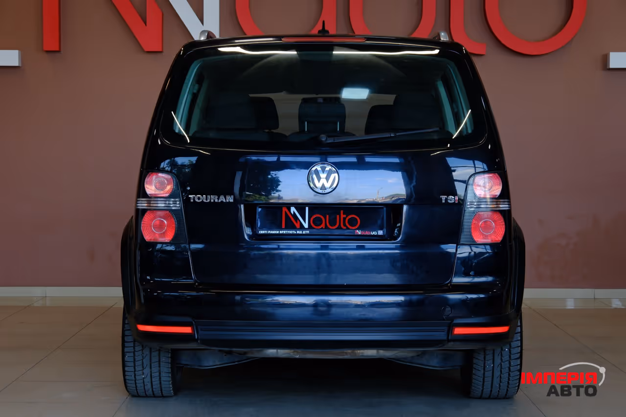 Volkswagen Touran - фото 5
