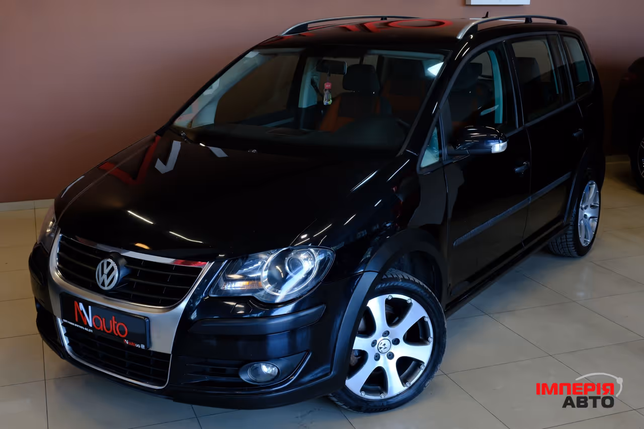 Volkswagen Touran - фото 2