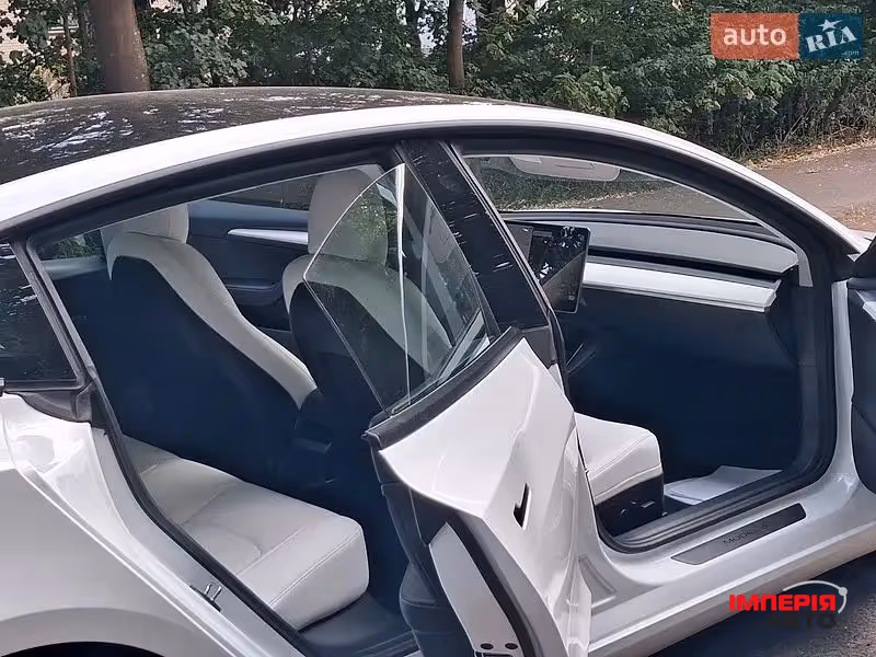 Tesla Model 3 - фото 2
