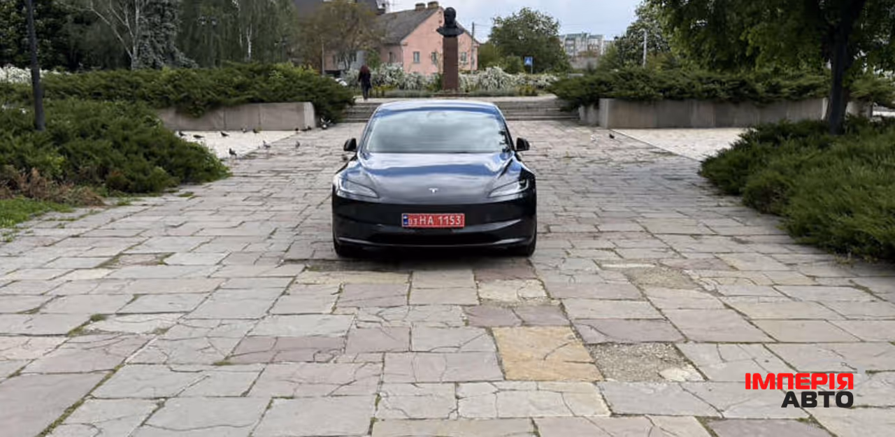 Tesla Model 3 - фото 12