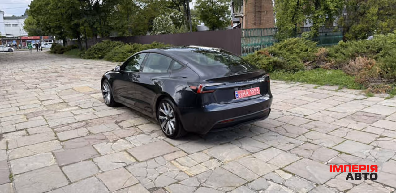 Tesla Model 3 - фото 9