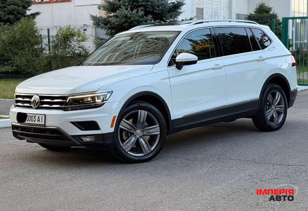 Volkswagen Tiguan - фото 1
