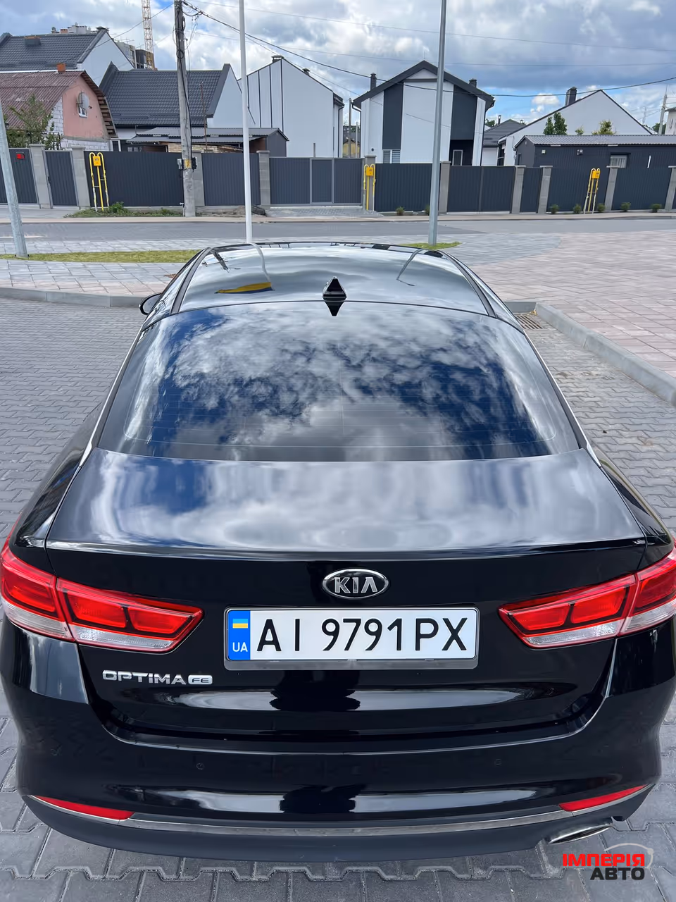 Kia Optima - фото 5