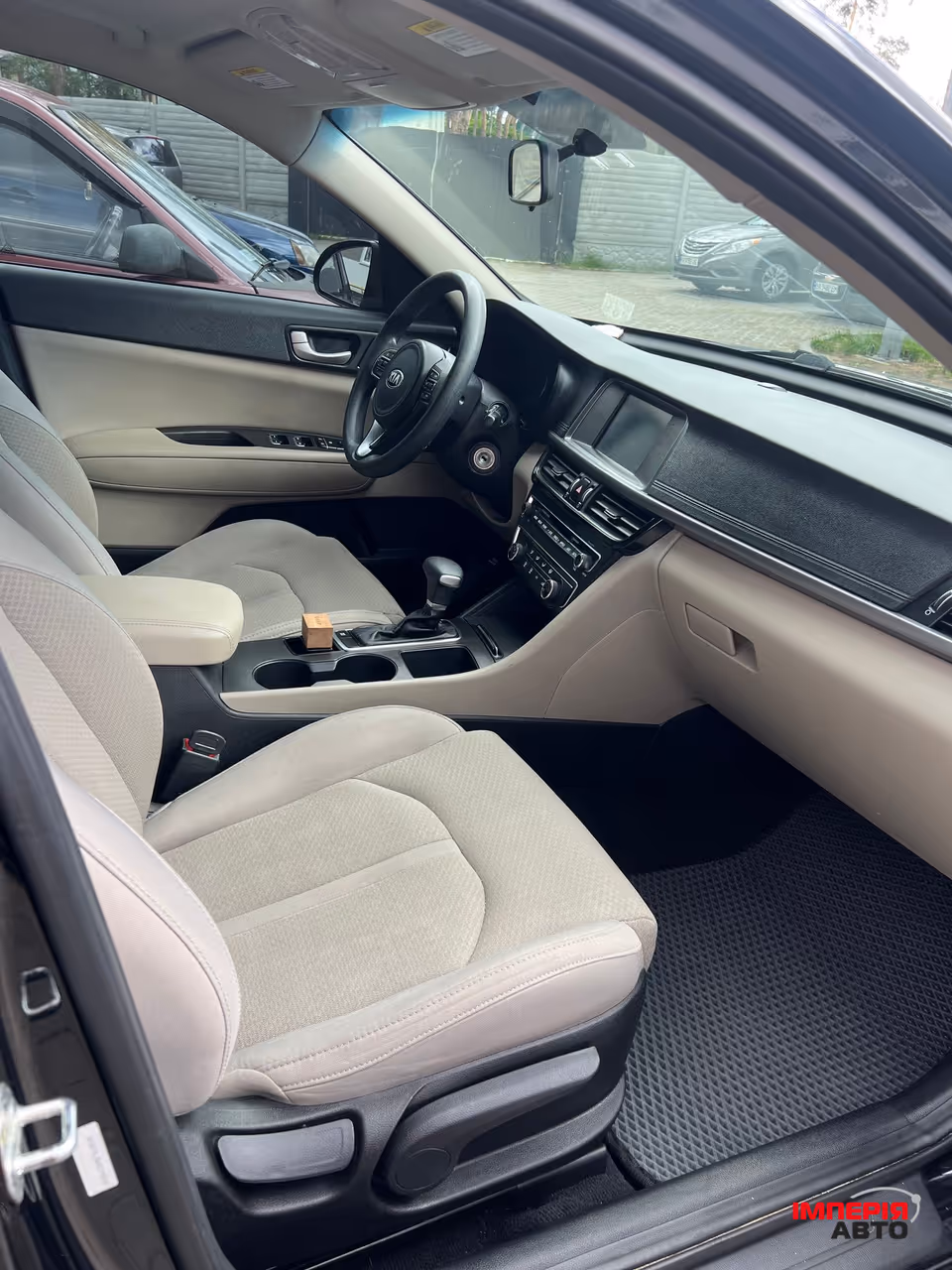 Kia Optima - фото 9
