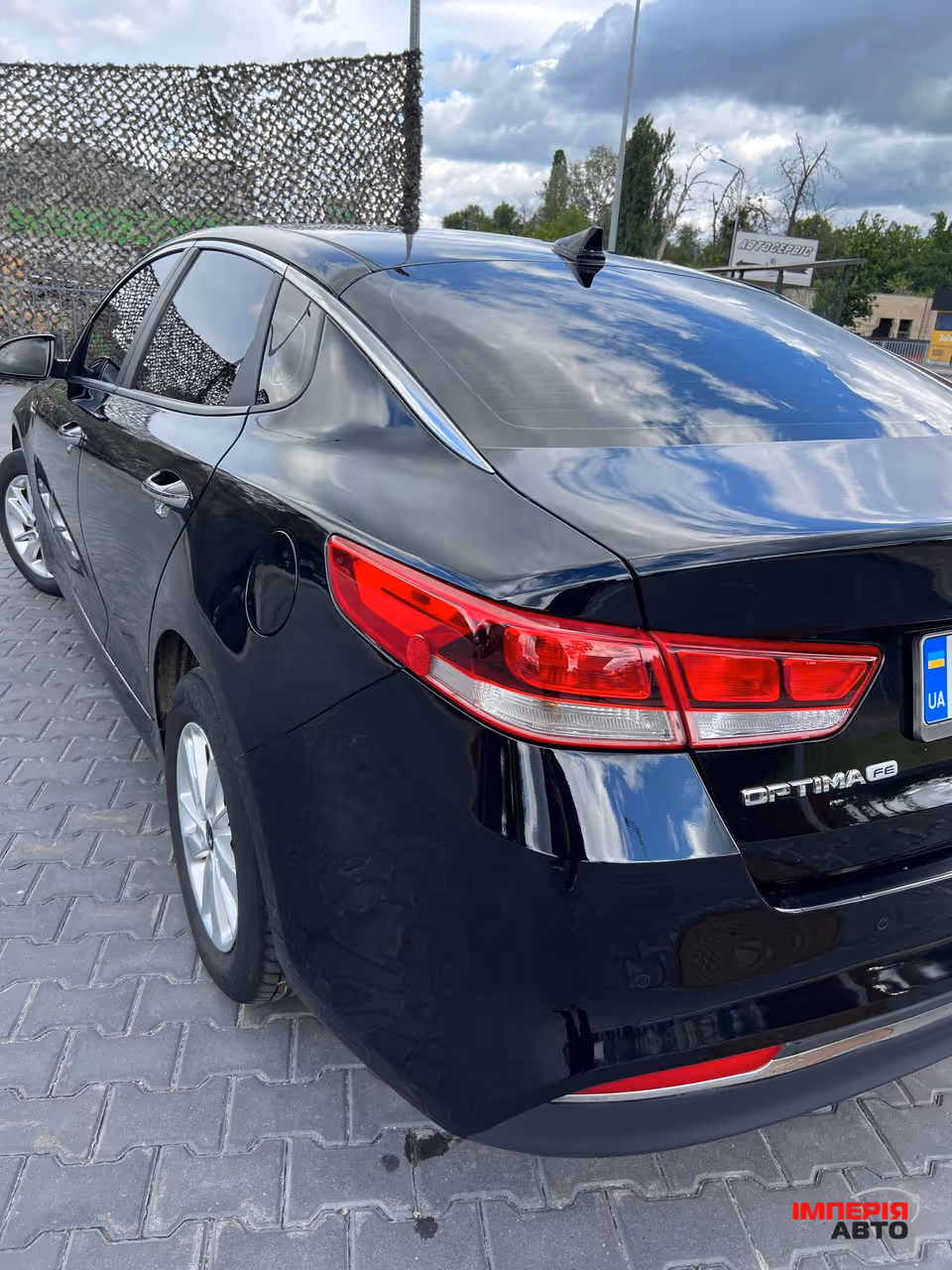 Kia Optima - фото 1