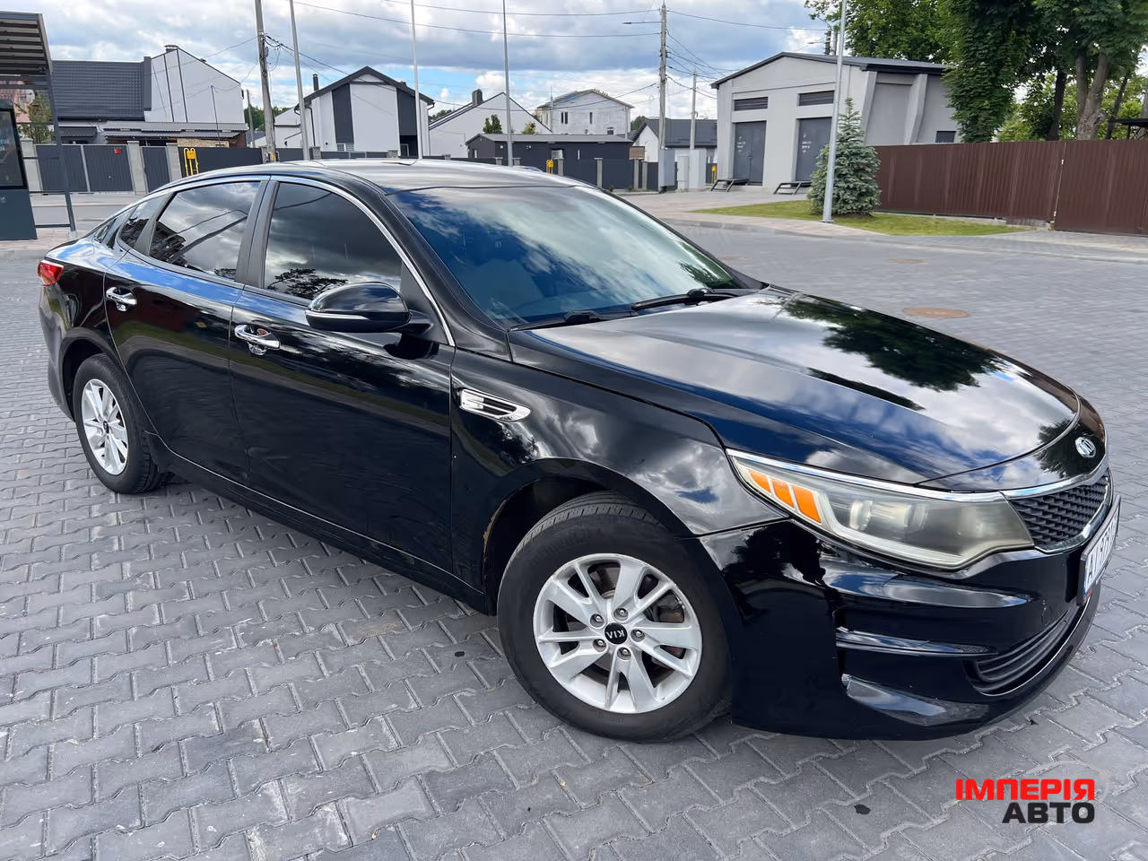 Kia Optima - фото 4