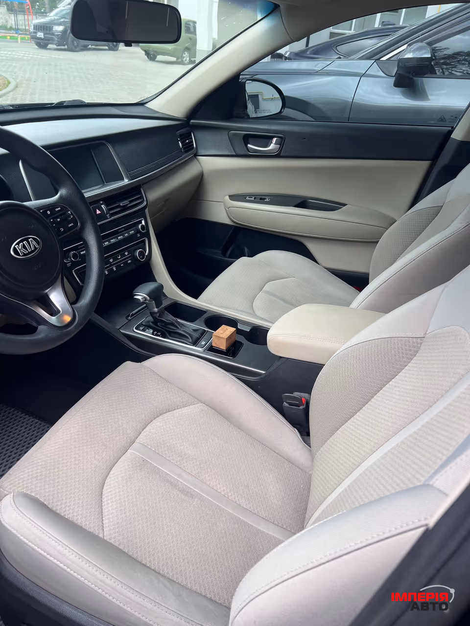 Kia Optima - фото 11