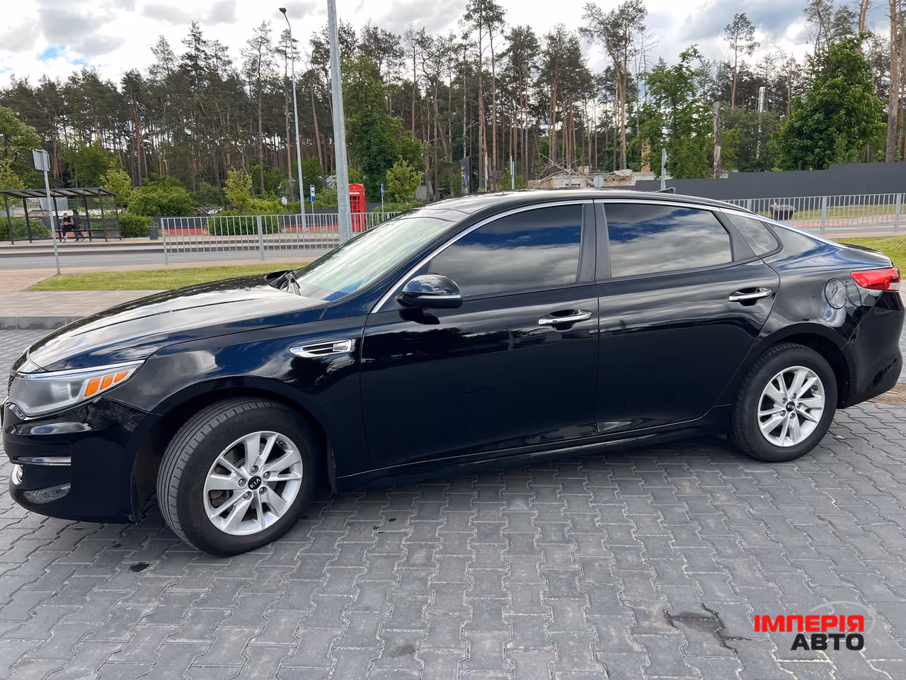 Kia Optima - фото 6