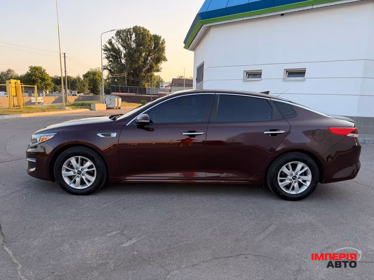 Kia Optima - фото 7