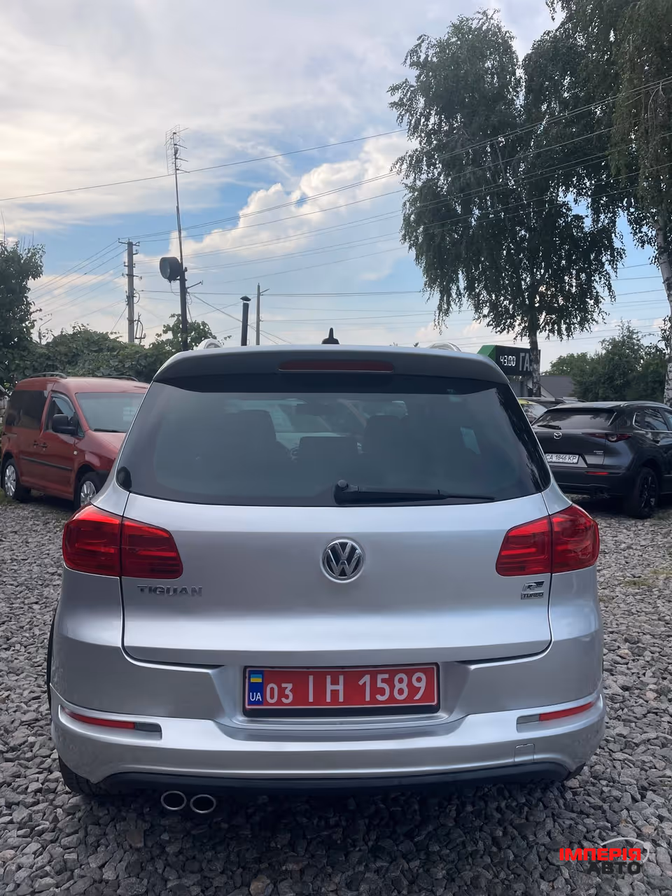 Volkswagen Tiguan - фото 11