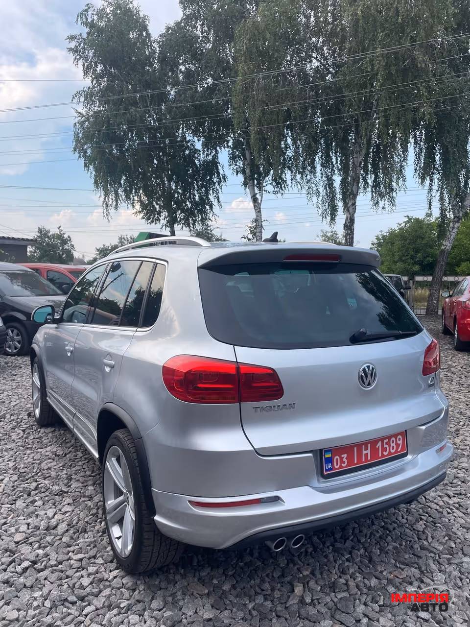 Volkswagen Tiguan - фото 12