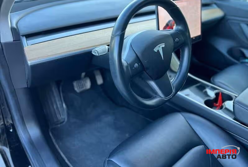 Tesla Model 3 - фото 8