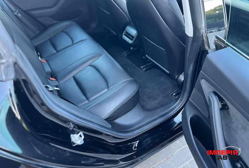Tesla Model 3 - фото 9