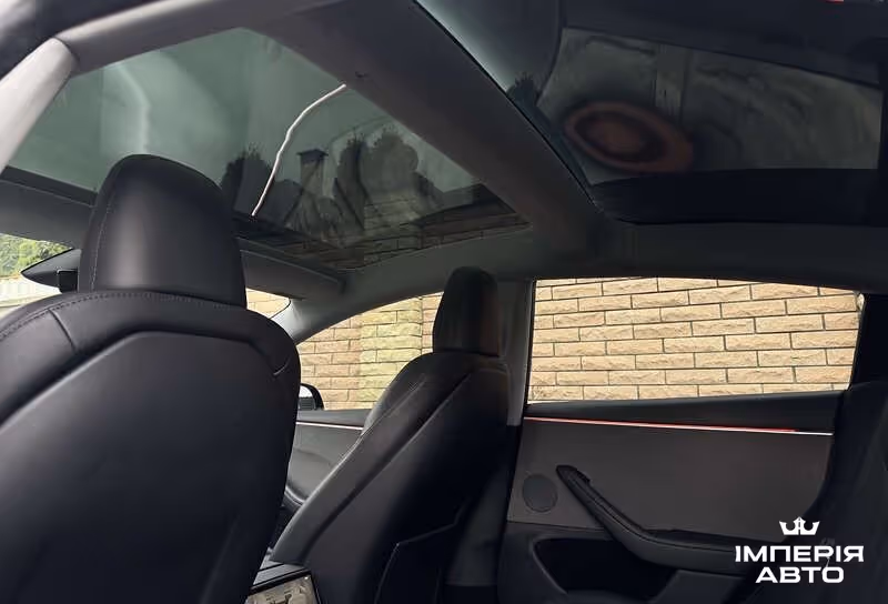 Tesla Model 3 - фото 10