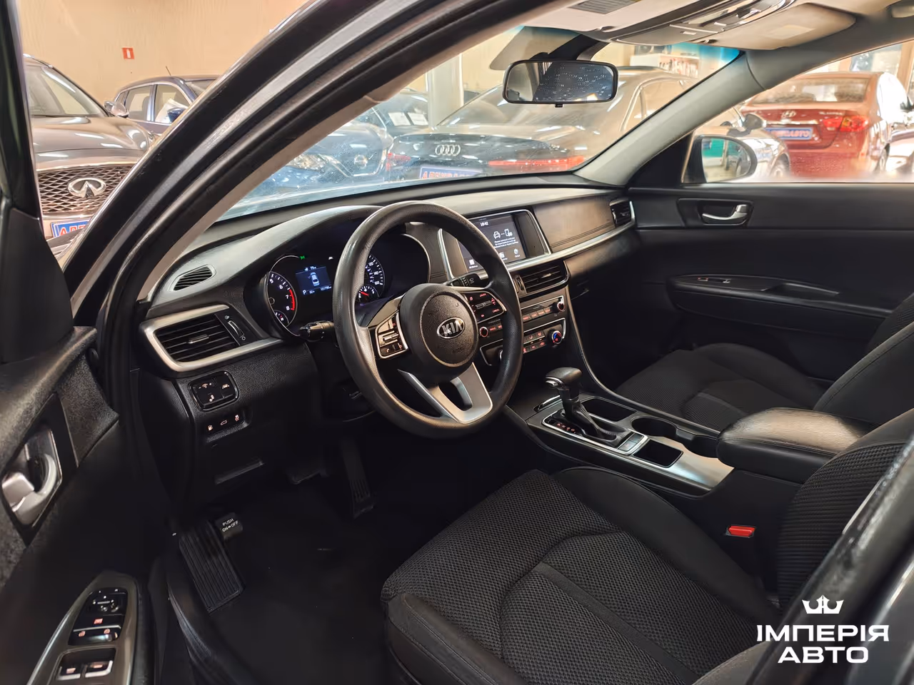 Kia Optima - фото 10