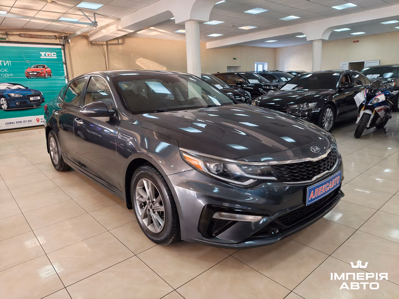 Kia Optima - фото 1