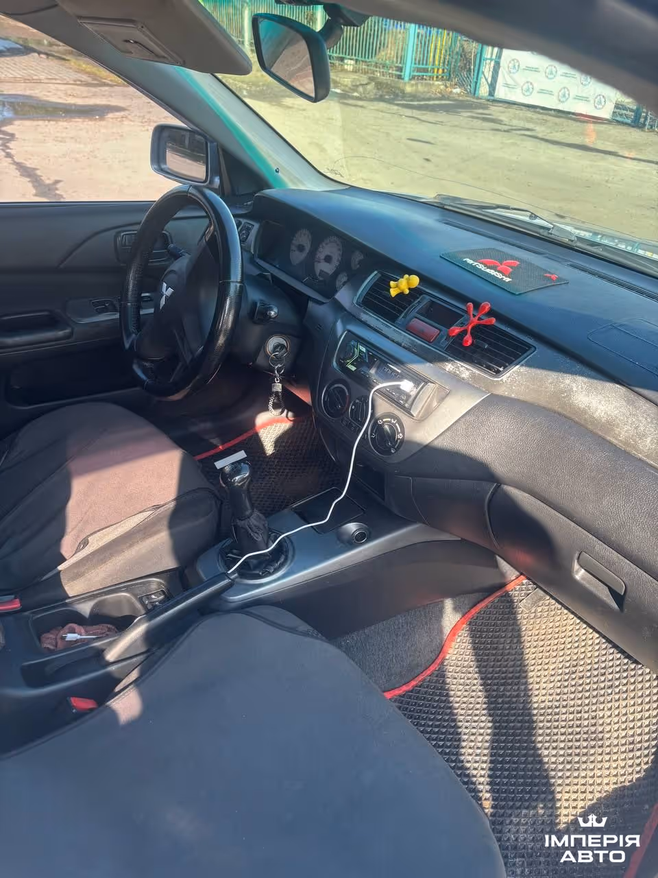 Mitsubishi Lancer - фото 6