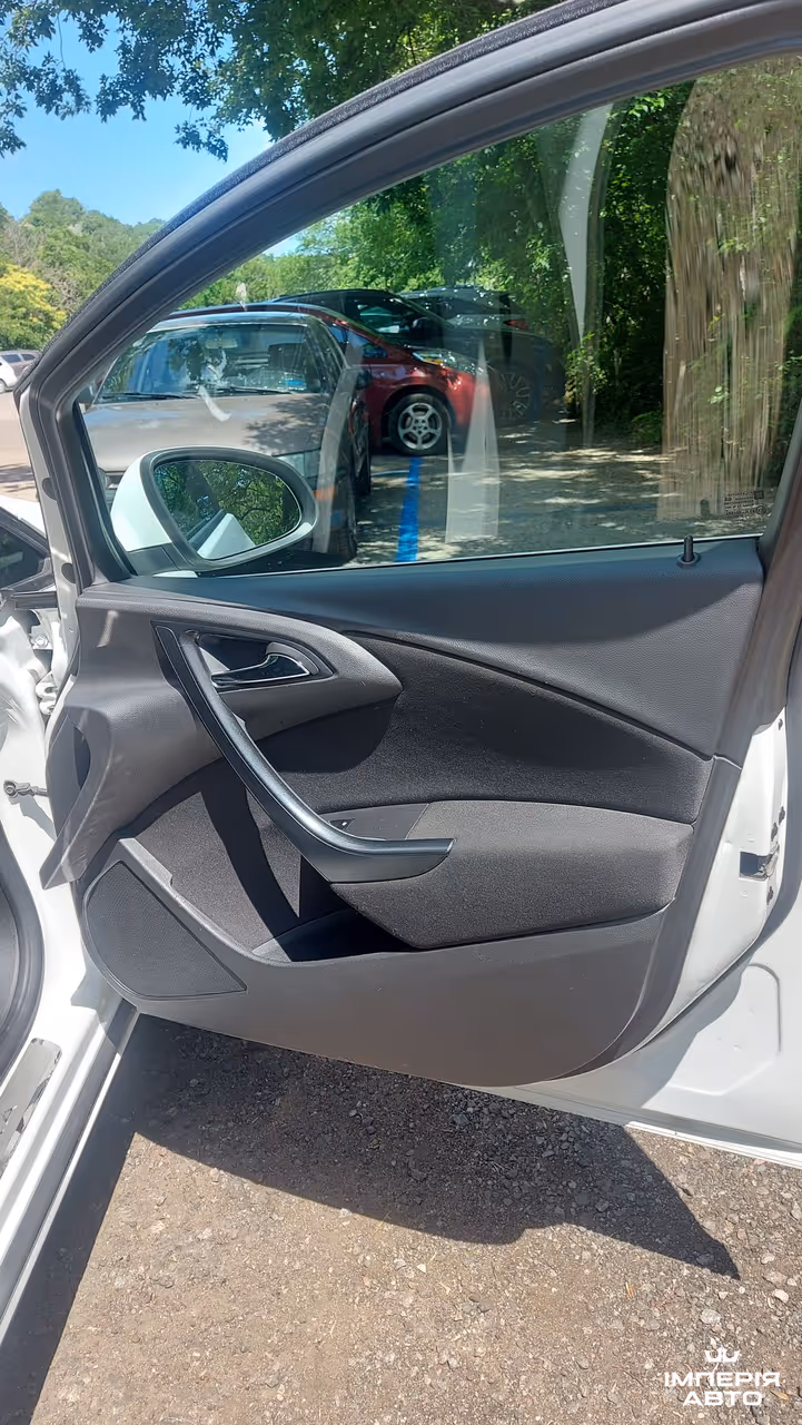 Opel Astra - фото 16