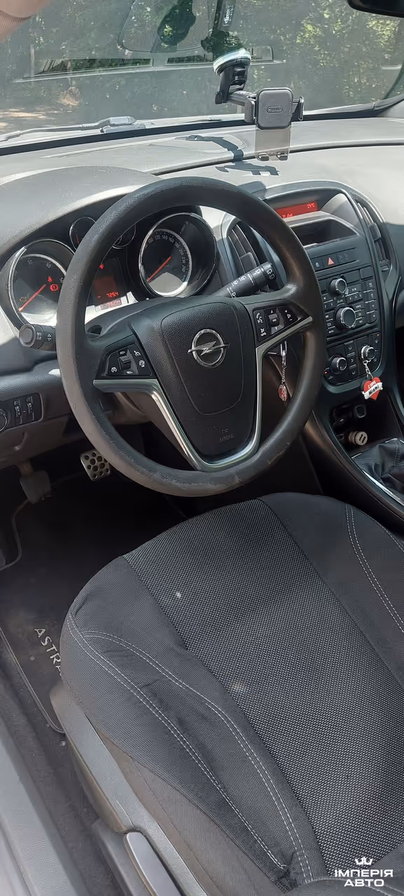 Opel Astra - фото 8